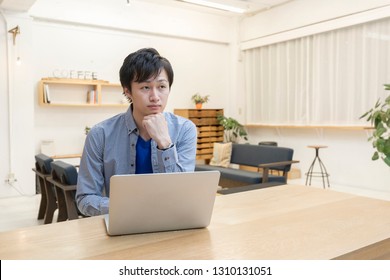 A Man Who Plays A Personal Computer