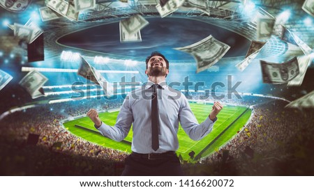 Man who rejoices at the stadium for winning a rich soccer bet
