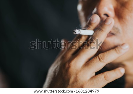 A man who is smoking