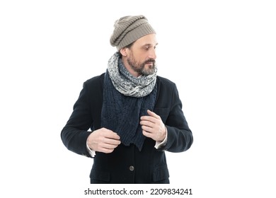 Man Winter Fashion With Warm Clothes. Studio Shot Of Man Wearing Warm Scarf And Hat.