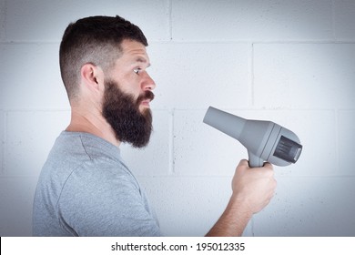 Man Wipes His Beard With Hair Dryer