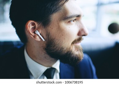 man with wireless earpiece
