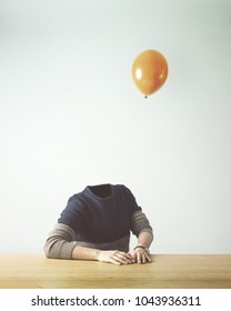 Man Without Head Obsverving Balloon Flying Away