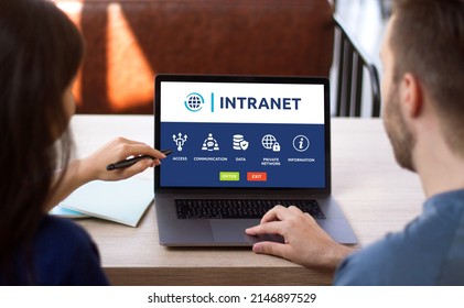 Man and woman access to intranet interface on computer laptop. Private network of organization concept - Shutterstock ID 2146897529