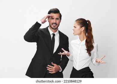 Man And Woman Anger Business In Business At Each Other Shouting With Their Hands Up In The Air Against A White Isolated Background. The Concept Of Business In A Couple Harassment Startup Copy Space