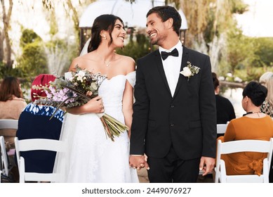 Man, woman and couple holding hands at wedding ceremony with flower bouquet, marriage or celebration. Bride, groom and guests at outdoor park or party for summer reception, backyard or commitment