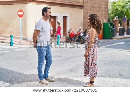 Similar – Image, Stock Photo Young couple having fun in a summer day