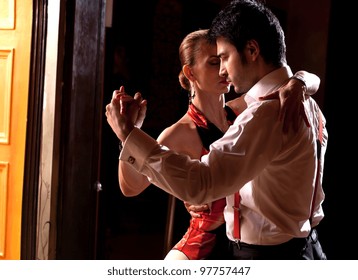 A Man And A Woman Dancing Argentinian Tango. Please See More Images From The Same Shoot.