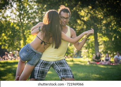 Man And Woman Dancing Dip Move Training Latin American Dance Outdoors