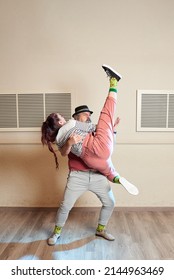 A Man And A Woman Dancing Lindy Hop In A Dance Studio