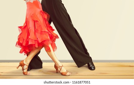 Man And A Woman Dancing Salsa On Background