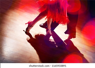 Man And A Woman Dancing Salsa On Background