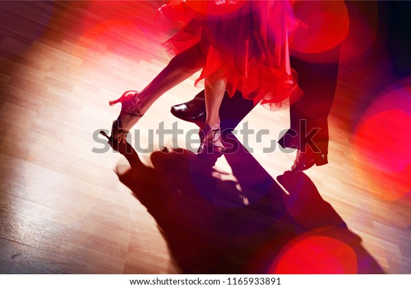 Man and a woman\
dancing Salsa on background