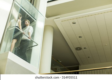 Man And Woman In The Elevator