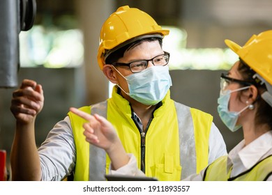 Man And Woman Engineering Wearing Protection Face Mask And Safety Helmet In Factory Industrial.