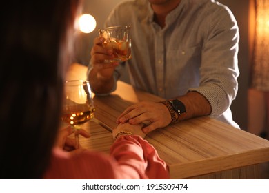 Man And Woman Flirting With Each Other In Bar, Closeup