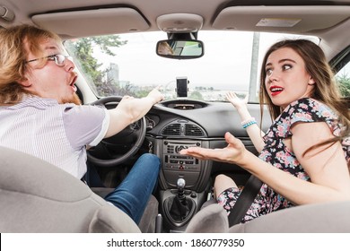 Man And Woman Funny Couple Arguing In Car Having Relationship Problem, Yelling At Each Other. Boyfriend Being Scared Of Female Driving.