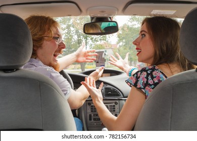 Man And Woman Funny Couple Arguing In Car Having Relationship Problem, Yelling At Each Other.