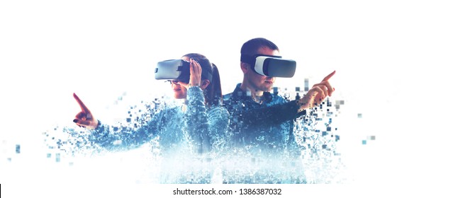 A man and a woman in glasses of virtual reality. The concept of modern technologies and technologies of the future. Fragmented by pixels. VR glasses.