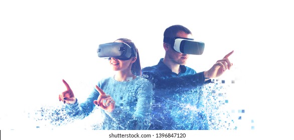 A man and a woman in glasses of virtual reality. The concept of modern technologies and technologies of the future. Fragmented by pixels. VR glasses.