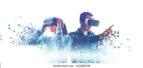 A man and a woman in glasses of virtual reality. The concept of modern technologies and technologies of the future. Fragmented by pixels. VR glasses. - Shutterstock ID 1416809330