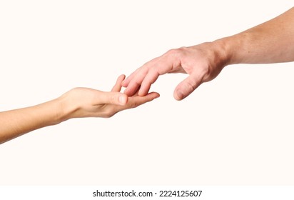 Man and woman hands reaching to each other, close-up. Two hands touching isolated on white background.  - Powered by Shutterstock