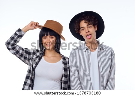 man with woman in hats                              