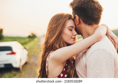 Man and woman hugging in holiday honeymoon trip on the road outdoors. Honeymoon trip. Couple embracing on road travel. Happy family. - Shutterstock ID 2183518289