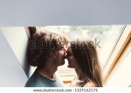 Similar – Happy young couple in love smiling under duvet cover