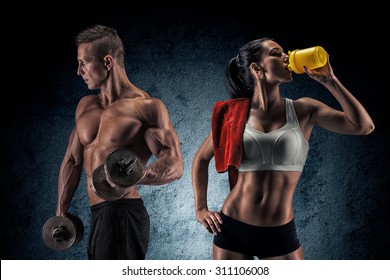 Man And Woman Isolated On A Dark Background