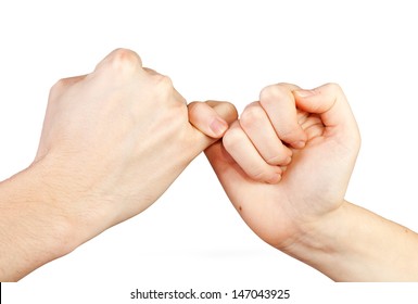 Man and woman making a pinkie promise. Hands isolated on white background.