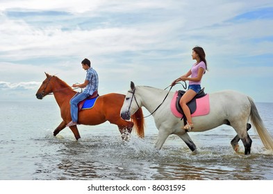 Man And Woman On Horseback