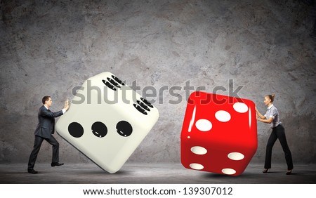 Man and woman pulling dices. Interaction concept
