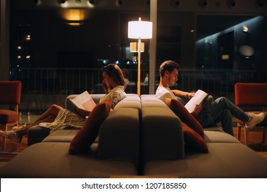 Man And Woman Reading Books - Natural Night Light