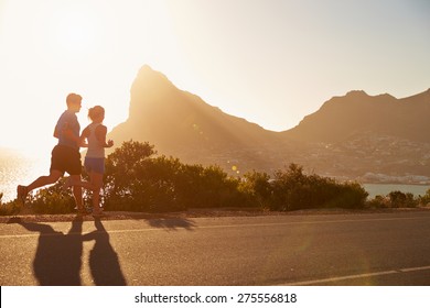 Man and woman running together - Powered by Shutterstock