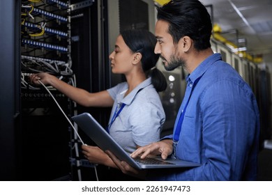 Man, woman or server room maintenance on laptop IT, software programming ideas or cybersecurity engineering. People, repair or data center technology in teamwork collaboration of safety analytics fix - Powered by Shutterstock