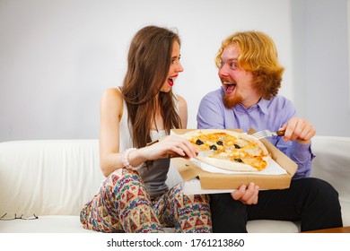 Man And Woman Spending Time Together. Couple Or Friends Eating Delicious Cheesy Pizza.