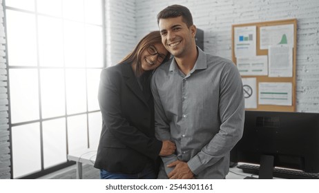 Man and woman standing together in a modern living room with a bright interior and large windows, looking happy and professional, showcasing a casual business environment. - Powered by Shutterstock