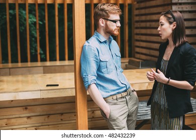 Man And Woman Talking. Discussion Business Ideas.