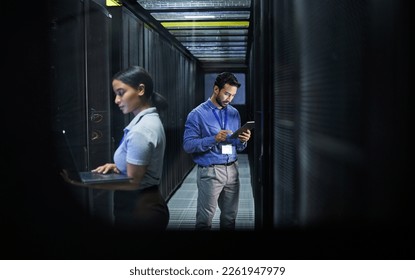 Man, woman or technology in server room, IT engineering or software programming for cybersecurity, analytics or database safety. Data center, programmer or coding developer on cloud, laptop or tablet - Powered by Shutterstock