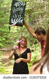 Man And Woman At Their Gender Reveal Party Outside