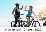 Man, woman or together on bicycle with high five in countryside for exercise, celebrate for workout goal. Team, people or bike with hands for training success on mountain, healthy motivation in sport