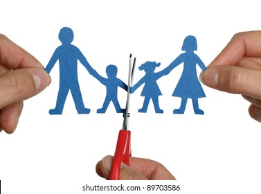 Man And Womans Hands Cutting Paper Chain Family Concept For Divorce And Child Custody Battle