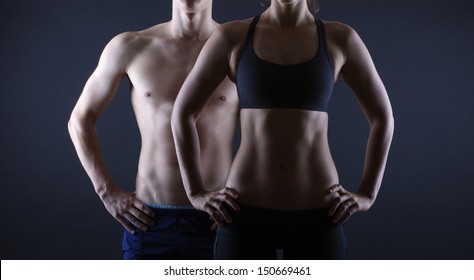 Man and woman's torso isolated on a black background