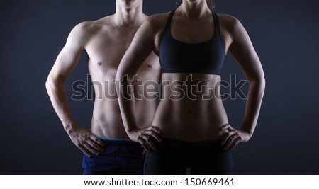 Man and woman's torso isolated on a black background