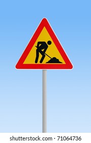 Man at work sign against blue sky - Shutterstock ID 71064736
