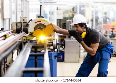 Man Worker At Industrial Factory Wearing Uniform And Hardhats. Engineering And Architecture Concept