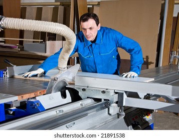 The Man The Worker, Works On The Machine Tool And Saws Wooden Products