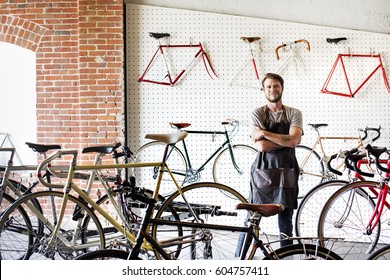 A Man Working In A Bicycle Repair Shop