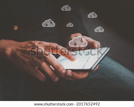 Man working with a Cloud Computing on Smartphone.Cloud computing concept.connect to data base station and operations.
